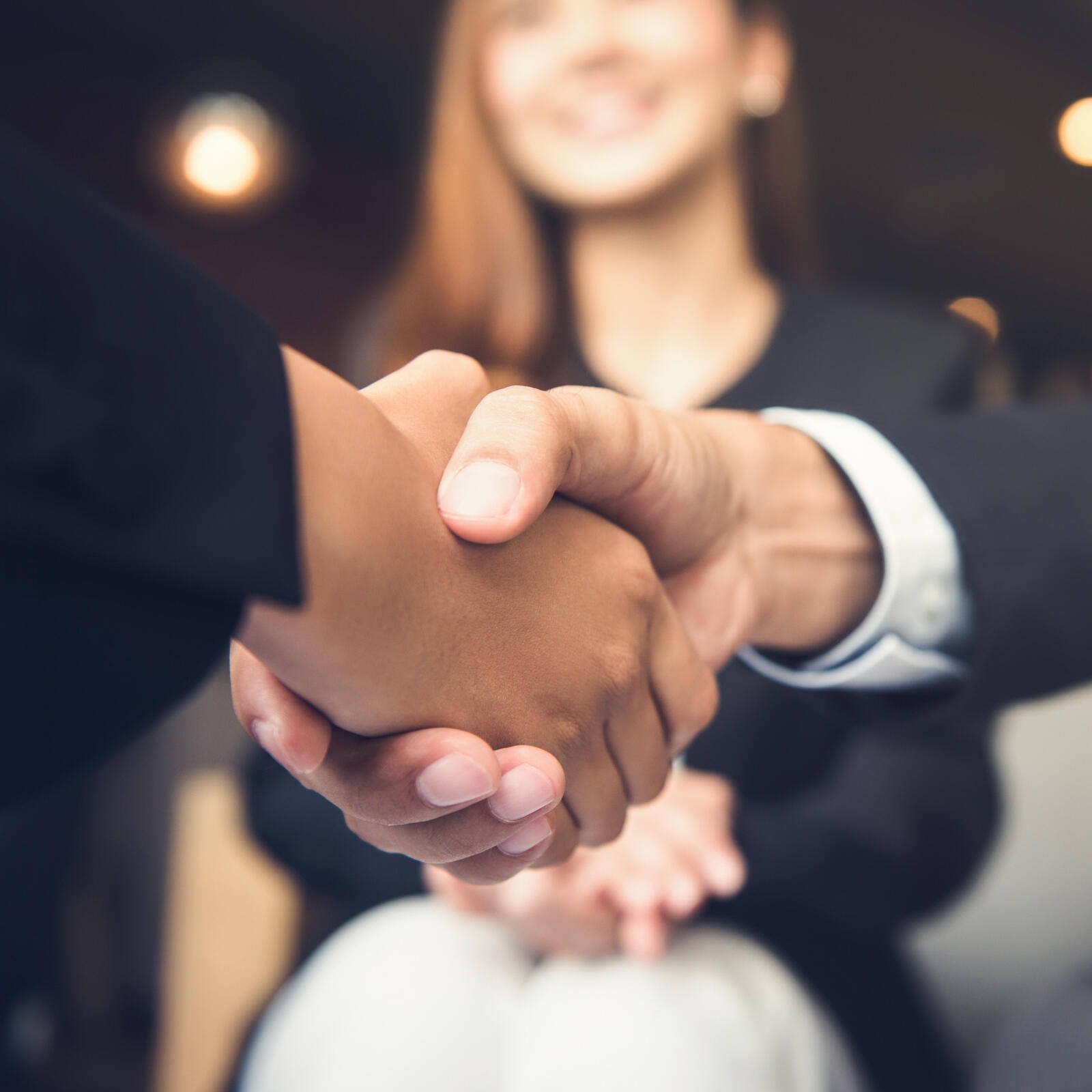 outsourced-brochure-handshake_Square